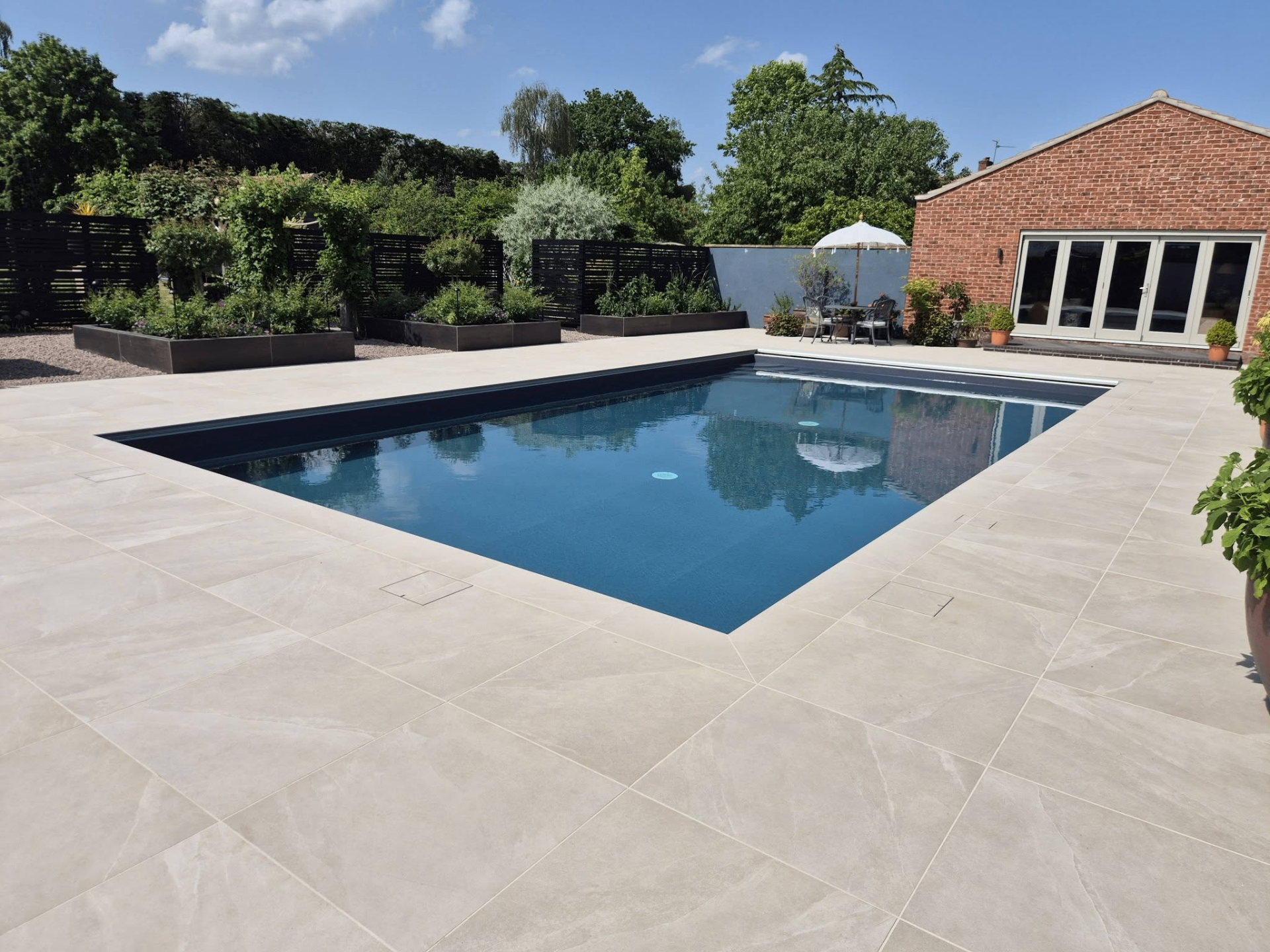 Luxury landscaped swimming pool at golden hour